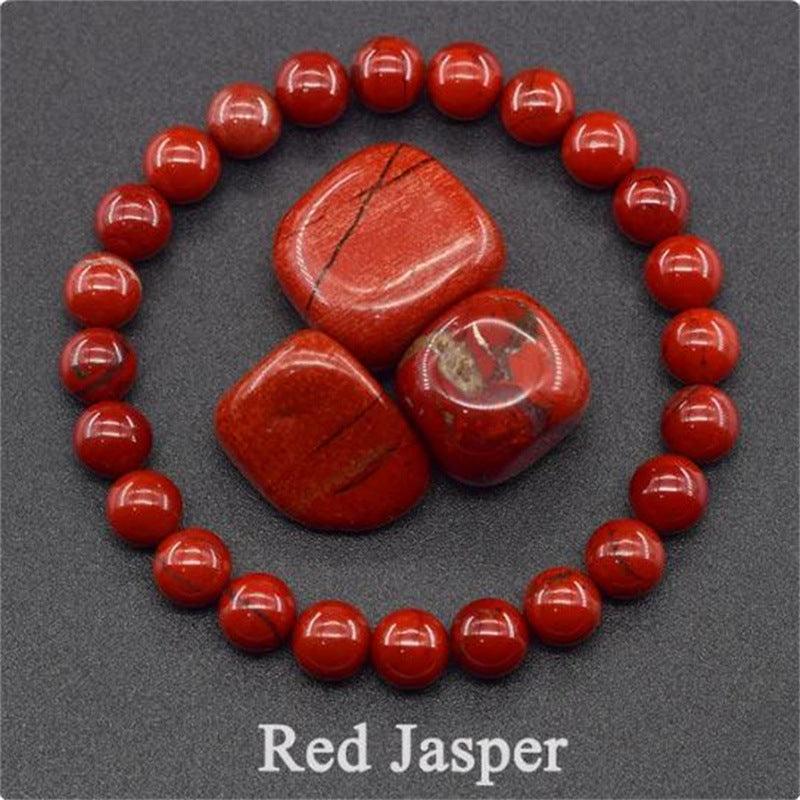Detailed view of the Red Jasper bracelet, capturing the powerful red tones that bring a sense of confidence and stability.